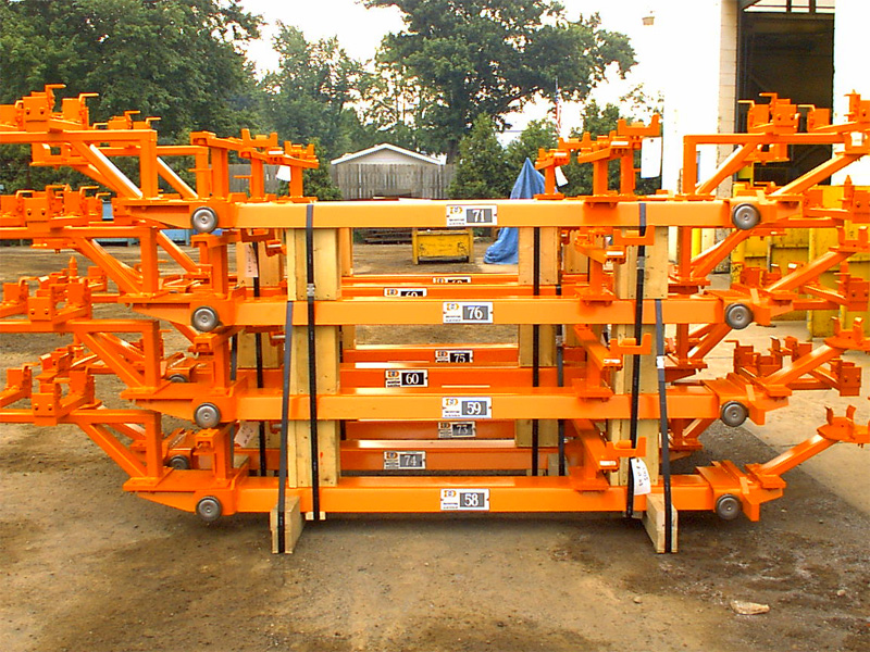 Stacked orange inverted carriers banded for shipment
